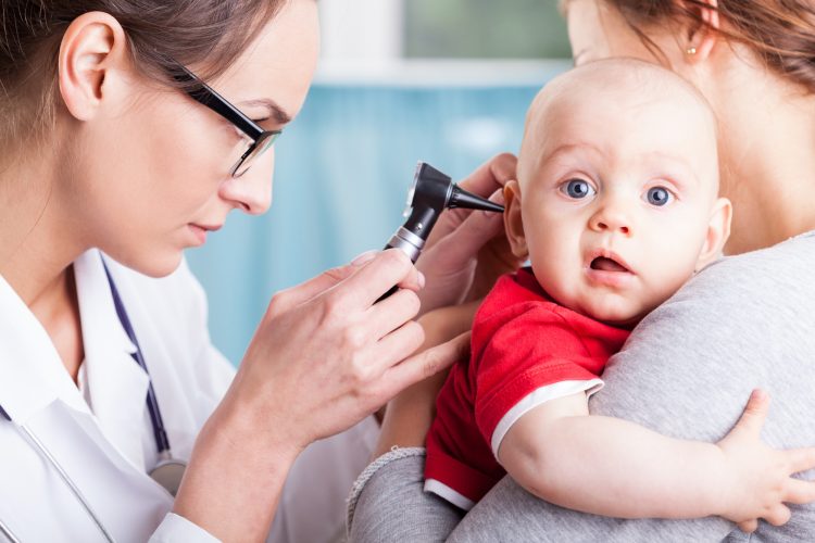 Provider-Checking-Baby's-Ear