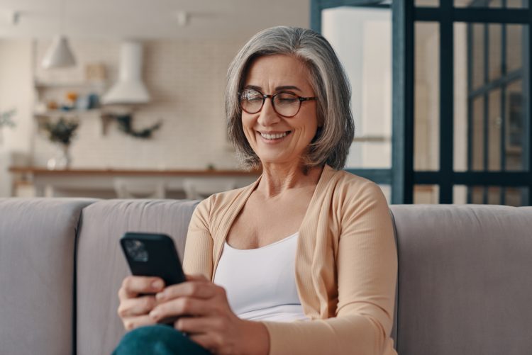 Woman-Checking-In-By-Phone
